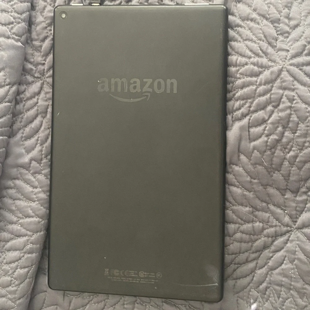 Sleek Black Tablet with Charging Cable